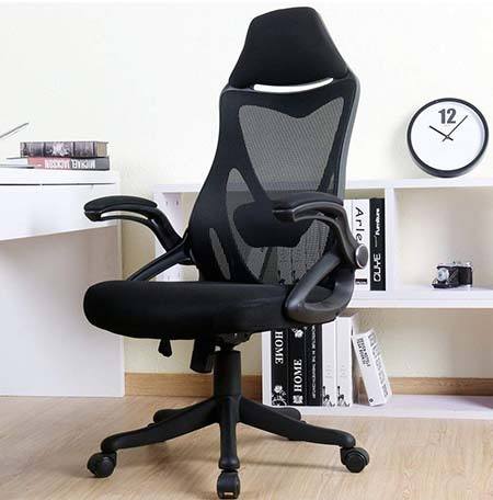 Black Zenith High Back Mesh Office Chair in a contemporary office with white desk and bookshelf