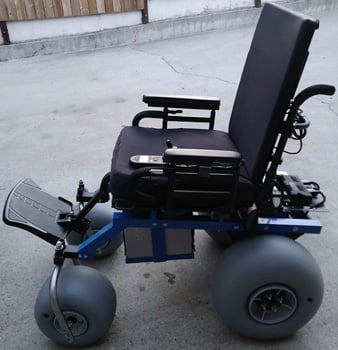 An Image of Right Side View of AJ’s Beach Cruzr Electric Wheelchair