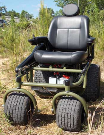 Outdoor Extreme Mobility Nomad All Terrain Power Wheelchair on dry grass