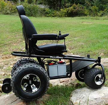 Left Side View of a Black Outdoor Extreme Mobility Nomad on grass