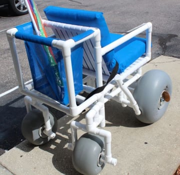 The Rolleez All Terrain Wheelchair's back compartment with mesh storage bag