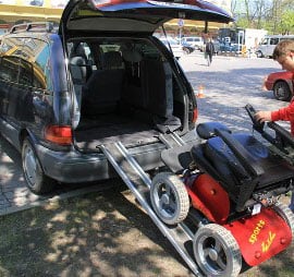 The Viking 4x4 Wheelchair being loaded into a van through a ramp