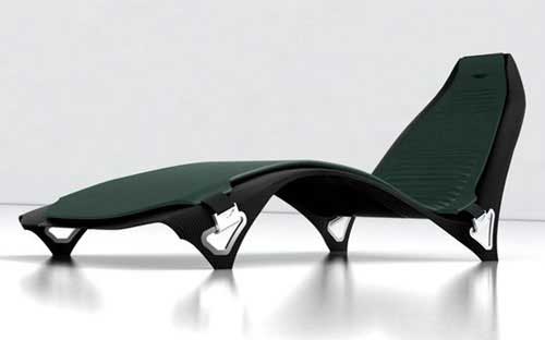 A sleek, green Aston Martin Lounge Chair 