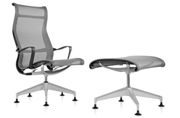 Setu Lounge Chair and Ottoman with mesh-like seat, backrest, and ottoman.