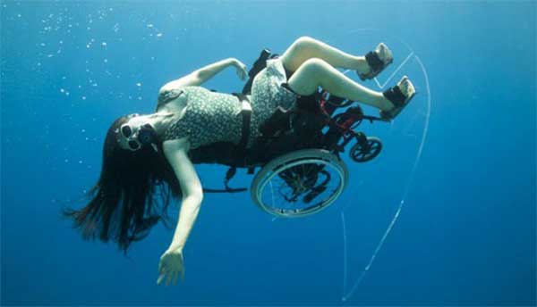Sue Austin’s Submersible Wheelchair Image of Sue Austin underwater with her Submersible Wheelchair