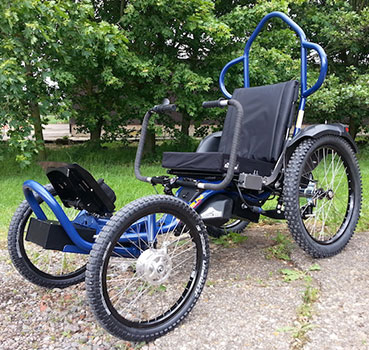 The Boma 7 Off Road Wheelchair with trees in the background