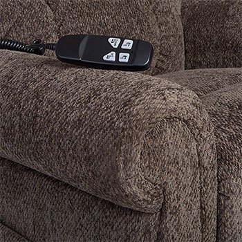 Remote Control of the Ashley Furniture Ernestine Power Lift Recliner on top of the chair's armrest