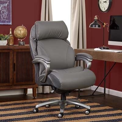 An image of Serta Smart Layers Big and Tall Chair on top of a rugged carpet in a study room