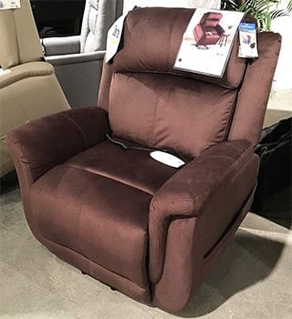 The Serta Hampton 872 Sleeper Recliner Lift Chair with tags and its remote 