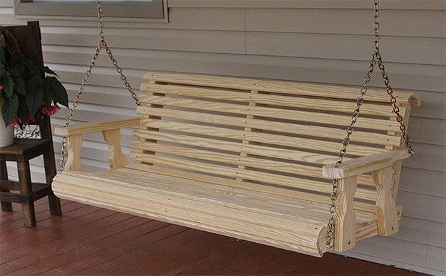 The CAF Amish Heavy Duty Roll Back Porch Swing hanging and a plant on a pot next to it