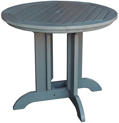Dining table of the Highwood 5 Piece Hamilton Round Dining Set with an umbrella hole in the center