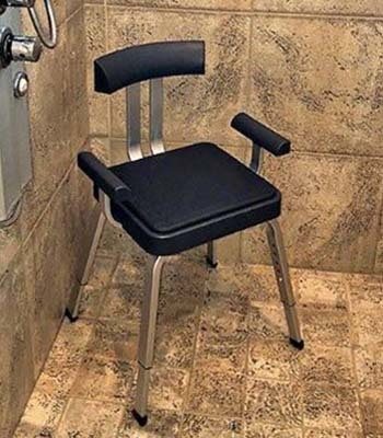 The Momentum Shower Safe Bath Chair and shower knobs on the left side