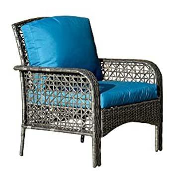 Chair of the Ovios 4 Piece Rattan Outdoor Set with blue cushion