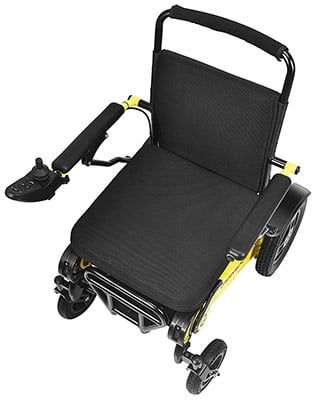 Navigator Electric Wheelchair with black mesh-covered back and seat cushion, and detachable joystick controller