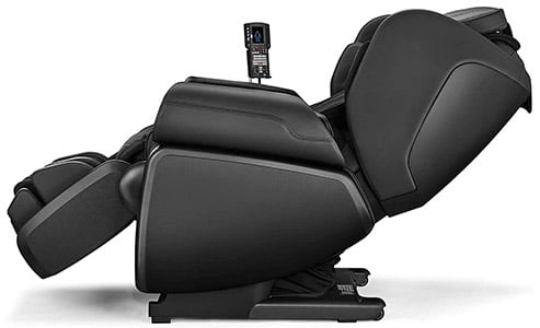 Synca Kagra Massage Chair black variant with the remote mounted on one arm and the chair in recline