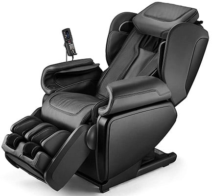 Synca Kagra massage chair black variant with remote on one arm and the chair in slight recline