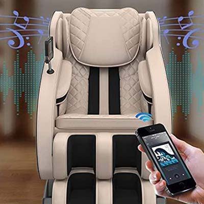 MM650 Massage Chair beige variant and a person holding a phone synced to the Bluetooth speakers and playing music