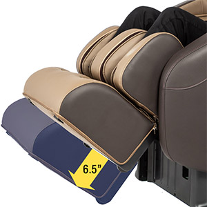 Person sitting on the Titan Commander Massage Chair brown variant with extendable footrests
