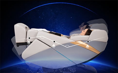 A woman sitting on the Ador 3D Allure taupe variant in zero gravity recline with the legs elevated slightly above the heart