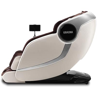 Arete Massage Chair with dark brown faux leather upholstery, ivory exterior, and a touchscreen remote mounted to one arm