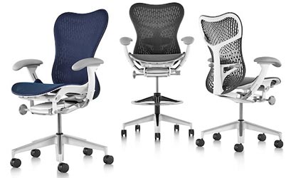 3 Mirra Chairs with white frame—blue with butterfly back, slate gray with butterfly back, and slate gray with Triflex back