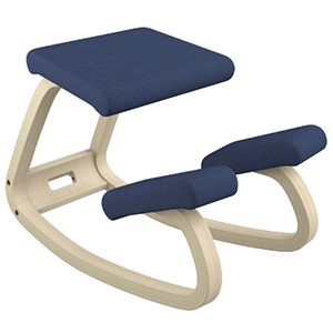 Varier Variable Kneeling Chair with dark blue fabric upholstery and chair frame built from treated beech plywood