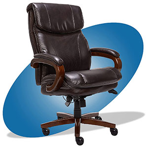Trafford Executive Chair with dark brown bonded leather upholstery, stained wood frame, padded armrests, and thick cushion